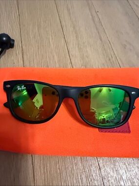 Ray-Ban JR RJ905S Black Frame Sunglasses with Green Mirrored Lenses
